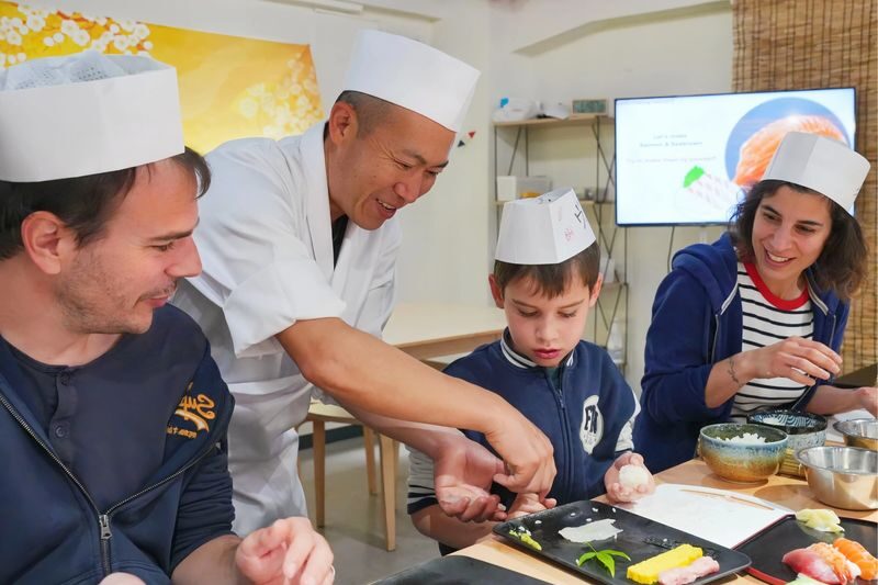 Tsukiji Fish Market Guided Tour & Sushi Making with Pro Chef - Reading Tsukiji Outer Market with a guide