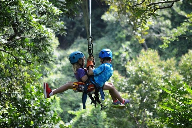 Tulum Adventure (Archeological Zone-Atv-Ziplines-Cenote-Lunch-Drinks-Rappel) - Flying Through the Canopy on a Zipline