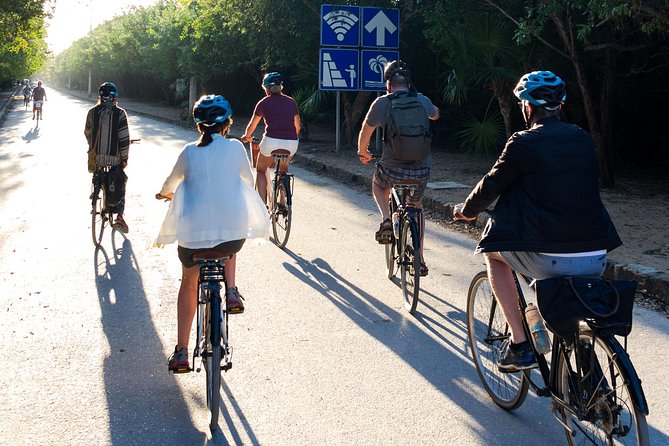 Tulum Bike Tour Tulum Maya Ruins Cenote Swimming Pueblo History Art Tacos Lunch - Taking a Refreshing Dip in a Cenote