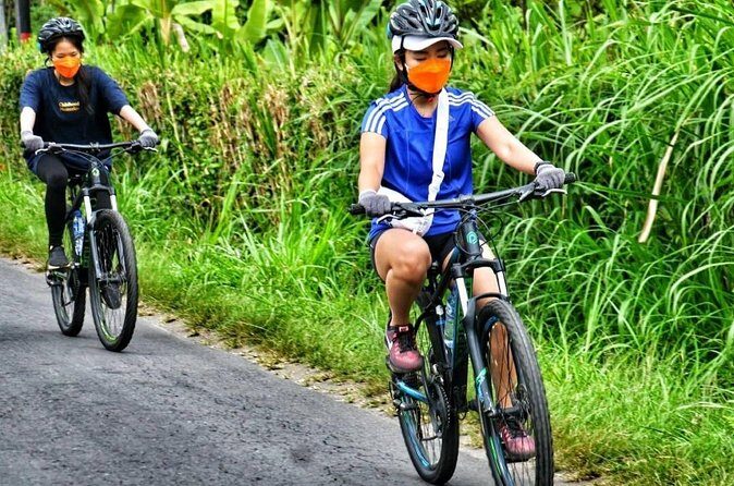 Ubud White Water Rafting and Cycling Tour All Inclusive - The Sum Up