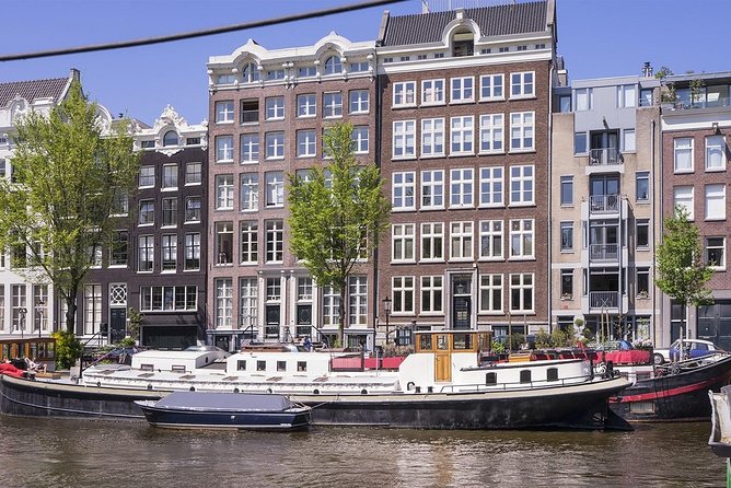 Unlimited Wine Tasting in a Saloon Boat on Amsterdams Canals - Inclusions