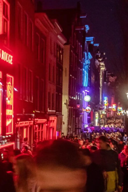 Unmasking Amsterdam's Redlight District Spanish Walking Tour - Nieuwmarkt Square and the De Waag