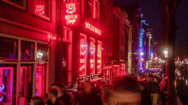 Unmasking Amsterdam's Redlight District Spanish Walking Tour - Frequently Asked Questions