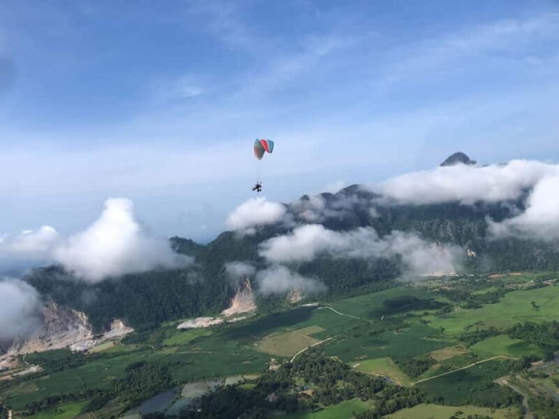 Vang Vieng: Paragliding Flight Single Ticket and Transfer - The Sum Up