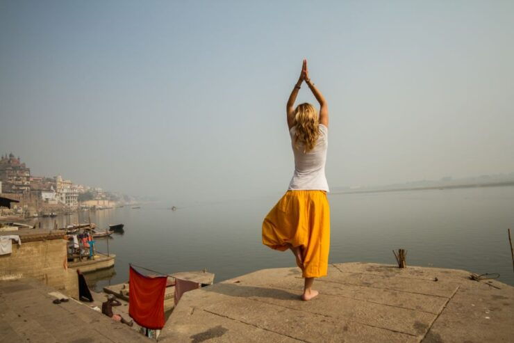 Varanasi: Morning Guided Boat Ride With Yoga - Experience