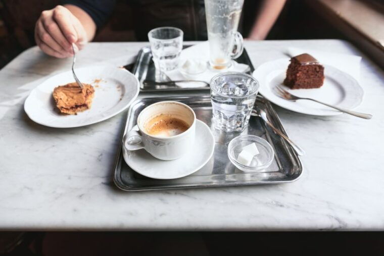 Vienna: Typical Austrian Food Tour with Coffee House Visit - Exploring Naschmarkt