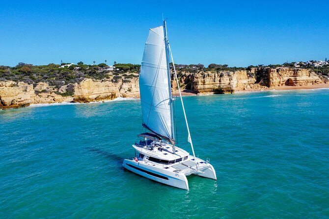 Vilamoura: 3 Hours Caves & Coastline Tour - "Unwind" - Wine, Snacks, and the Onboard Gastronomic Experience