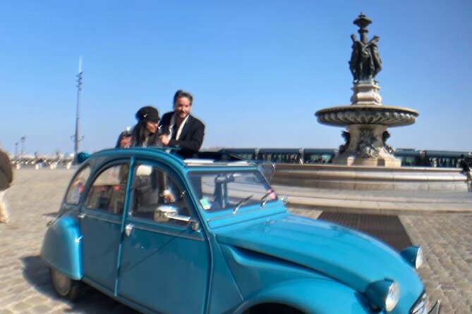 Visit of Bordeaux Unesco in a Classic Car & Delicacies - Strolling Through Quaint Streets and Squares