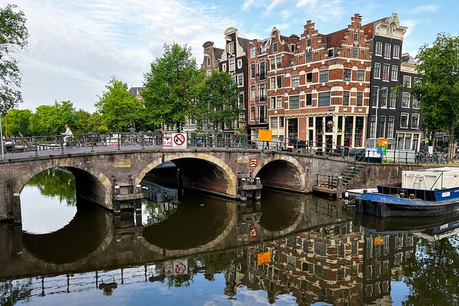 Walking Tour in Amsterdam With Enthusiastic and Fun Guide - Tour Inclusions and Itinerary