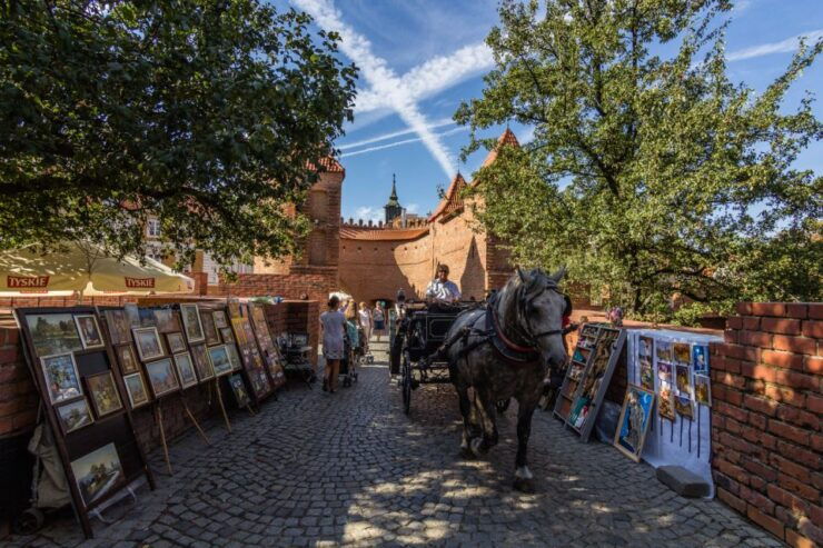 Warsaw: Layover City Tour by Car With Airport Pickup - Highlights of the Tour