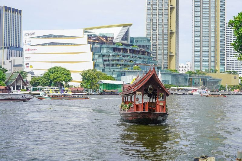 Wat Pho, Wat Arun & Flower Market Guided Walking Tour in Bangkok - A boat ride to Wat Pho