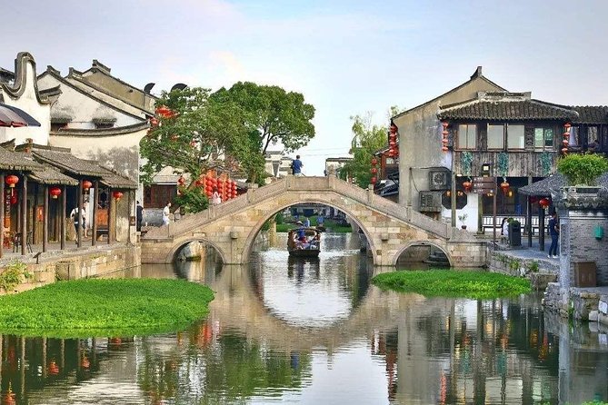 Xitang Water Town Layover Tour From Shanghai Airport - Duration and Boat Ride Details