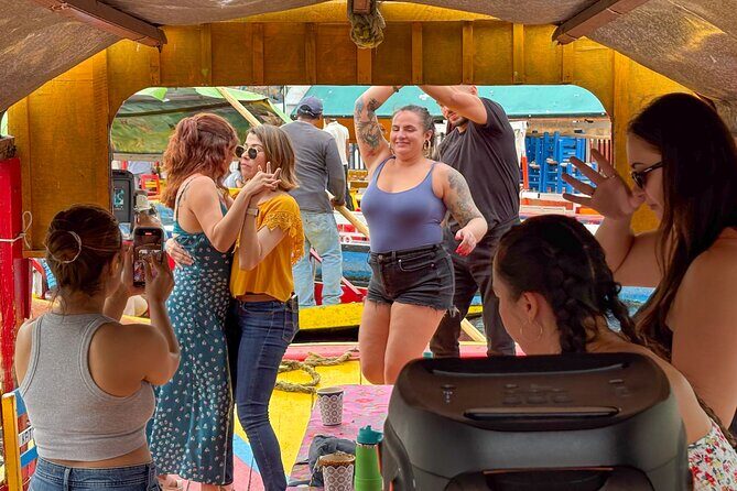 Xochimilco International boat party with open bar and tacos - Good To Know