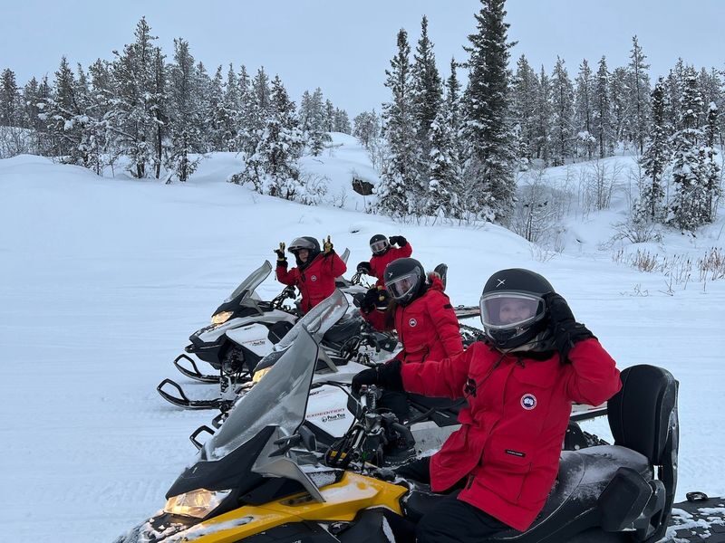 Yellowknife outdoor experience snowmobile - Forest trails, tundra, and photo stops