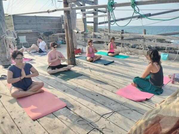 Yoga on the Trabucco in Vieste. - The Sum Up