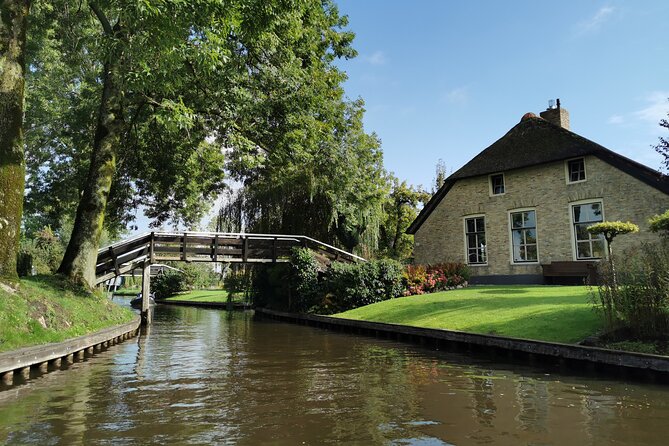 Zaanse Schans and Giethoorn Unique Day Trip With Boat Cruise - The Sum Up