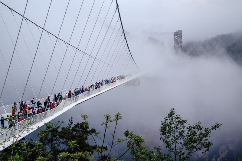 Zhangjiajie Grand Canyon and Glass Bridge Tickets - A bridge above a very deep canyon