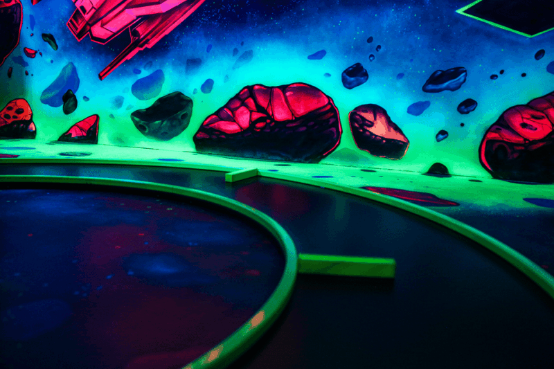 Zurich: Black Light Galaxy Minigolf - Experience Highlights