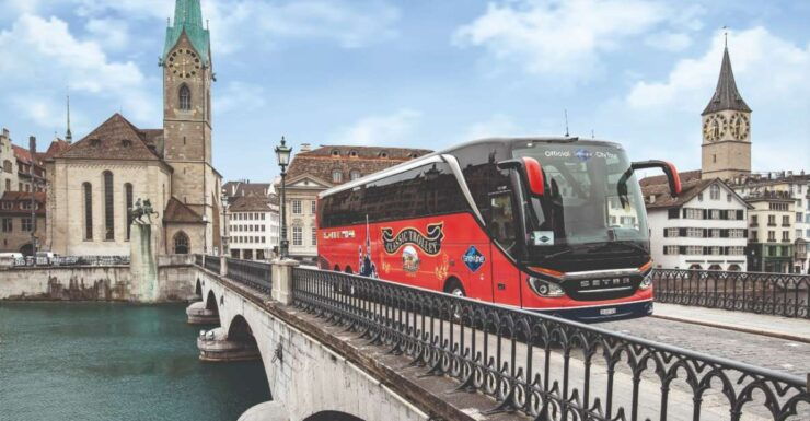 Zurich: City Bus Tour With Audio Guide and Lake Cruise - Sightseeing Experience