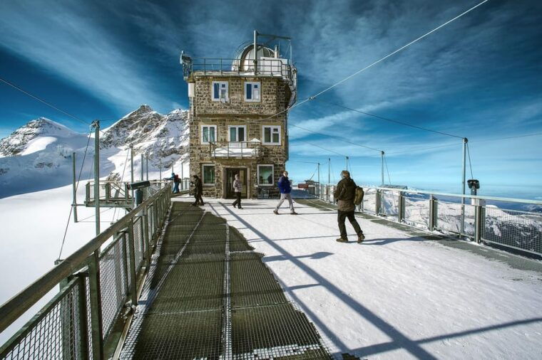 Zurich: Private Tour to Interlaken, Grindelwald & Jungfrau - Grindelwald Village: Picturesque Alpine Views