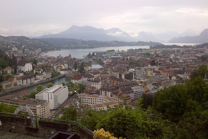 Zurich to Lucerne, Private City Tour, Boat Ride, Train Travel - Strolling Through the Wooden Chapel Bridge and Medieval Old Town